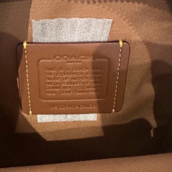 NWOT COACH Cream Turn Lock Sling Bag